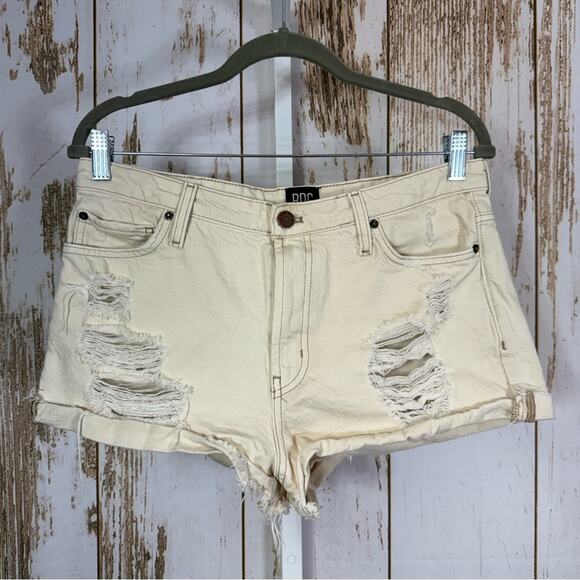 BDG Pants - BDG, Girlfriend High Rise, Off-White Distressed Jean Shorts. Size 29.